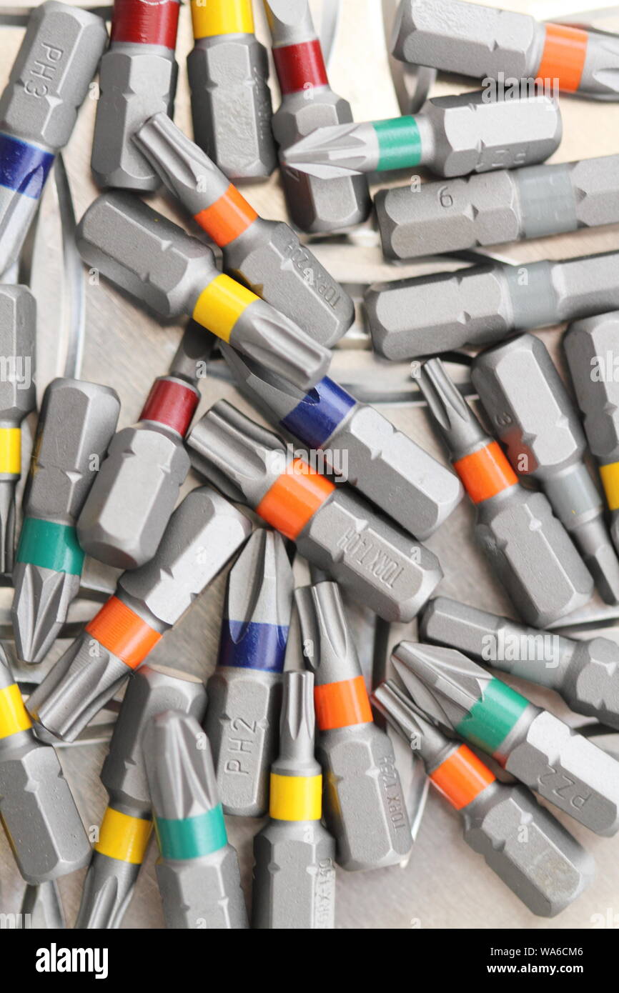 different colored bits for the cordless screwdriver Stock Photo Alamy
