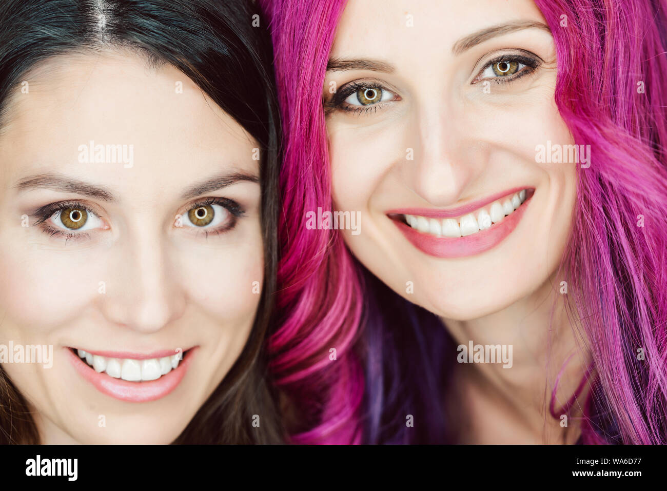 Make-up artist and her model posing for the camera Stock Photo