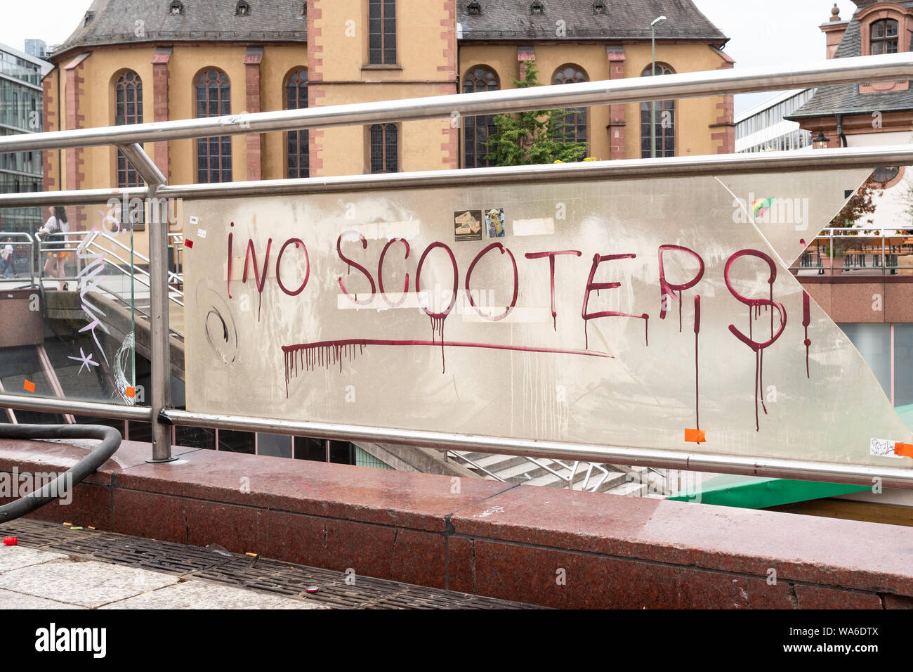 'No Scooters' - anti electric scooter graffiti in Hauptwache Plaza, Frankfurt am Main, Germany Stock Photo