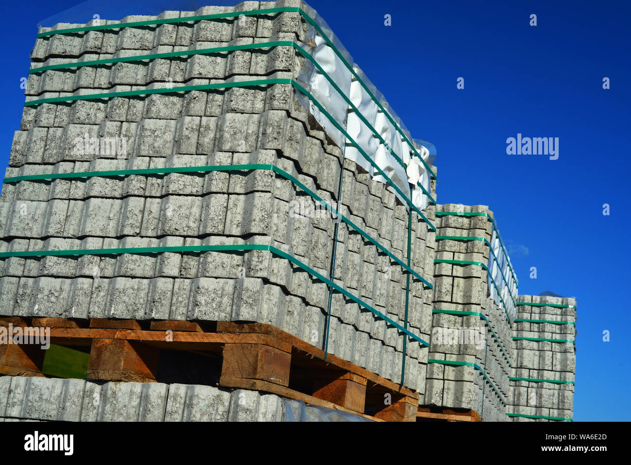 new cobblestons on pallet waiting for workers Stock Photo
