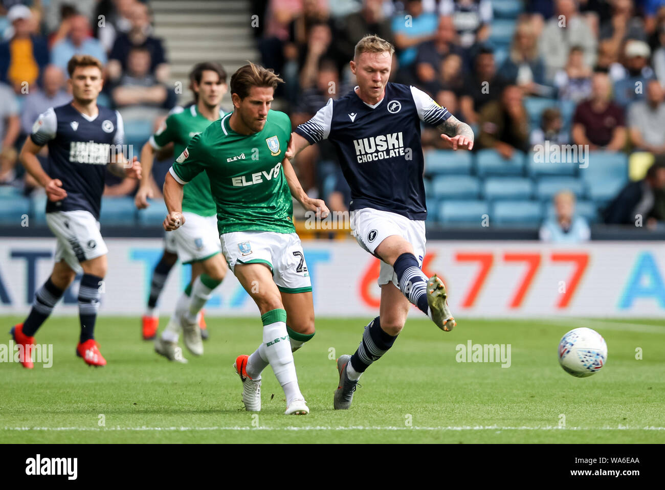 Sam Hutchinson of Sheffield Wednesday and Aiden O'Brien of Millwall challenge for the ball during the EFL Sky Bet Championship match between Millwall and Sheffield Wednesday at The Den, London, England on 17 August 2019. Photo by Ken Sparks.  Editorial use only, license required for commercial use. No use in betting, games or a single club/league/player publications. Stock Photo
