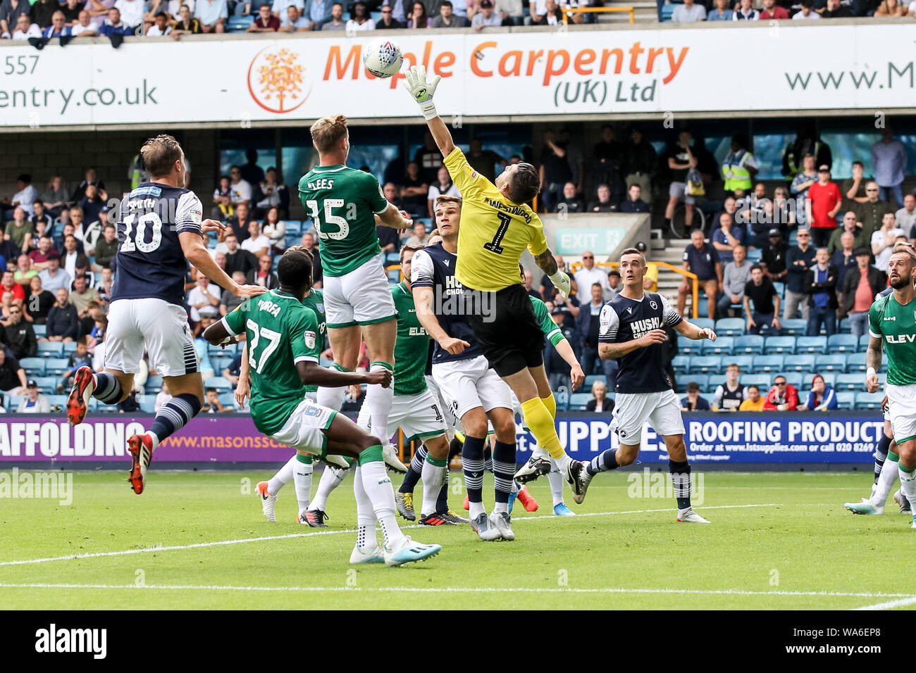 Matt Smith of Millwall scores the opening goal to make it 1-0 during the EFL Sky Bet Championship match between Millwall and Sheffield Wednesday at The Den, London, England on 17 August 2019. Photo by Ken Sparks.  Editorial use only, license required for commercial use. No use in betting, games or a single club/league/player publications. Stock Photo