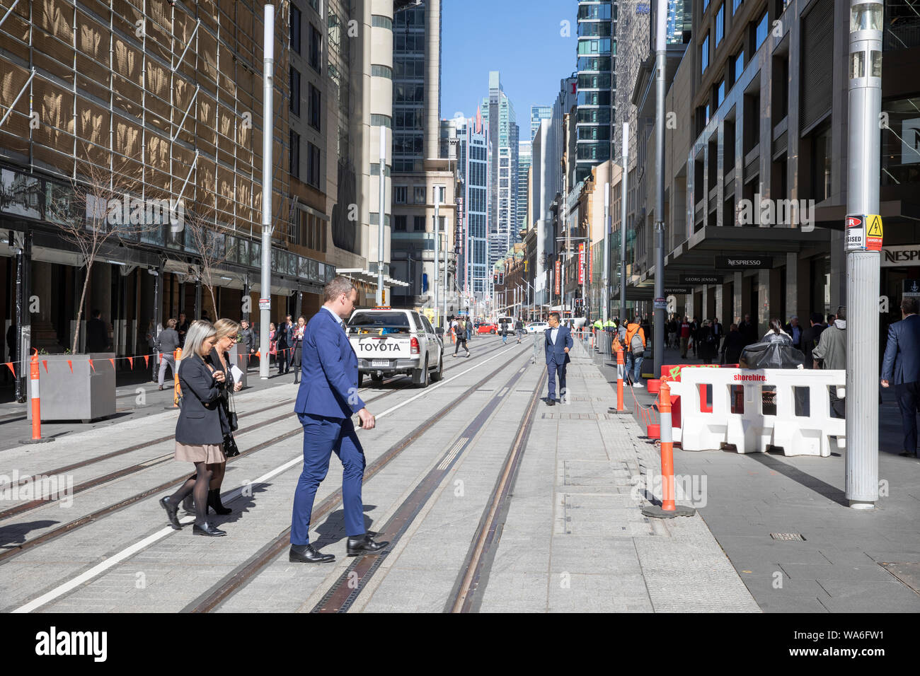 Sydney city centre office workers on street in the central