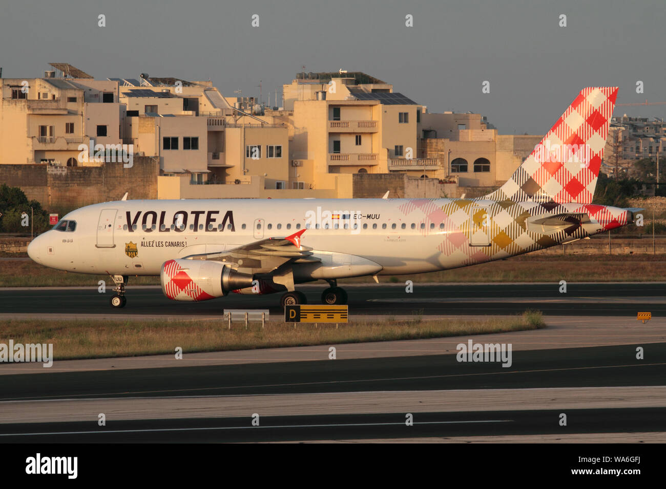 Airbus A319 commercial passenger jet plane belonging to Spanish low cost airline Volotea taxiing on arrival in Malta Stock Photo