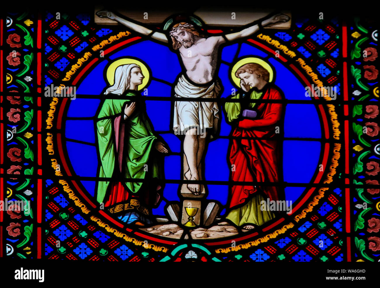 Stained Glass in the Chapel of Notre-Dame-des-flots (1857) in Sainte Adresse, Le Havre, France, depicting the Crucifixion of Jesus Stock Photo