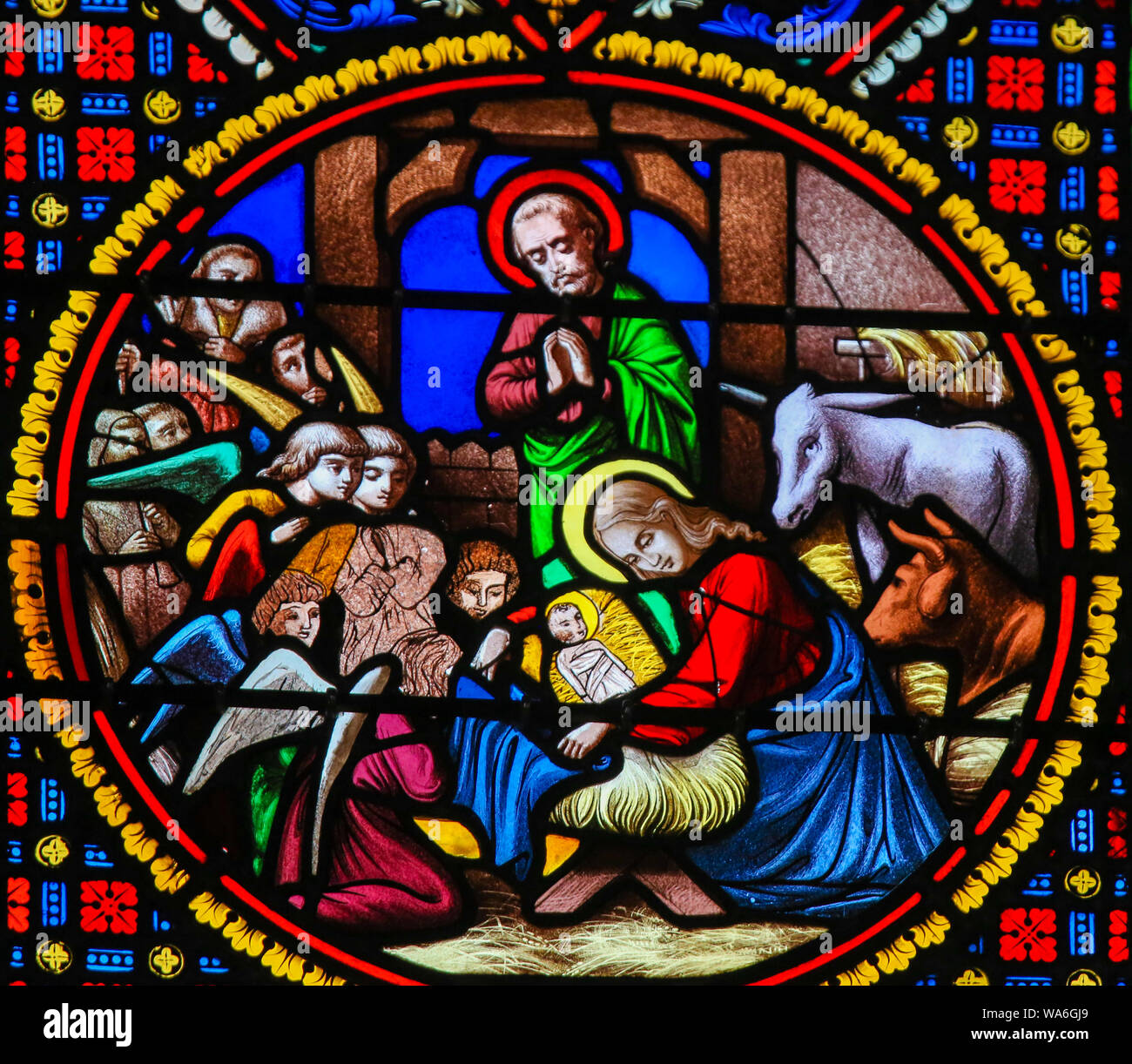Stained Glass in the Chapel of Notre-Dame-des-flots (1857) in Sainte Adresse, Le Havre, France, depicting a Nativity Scene at Christmas Stock Photo