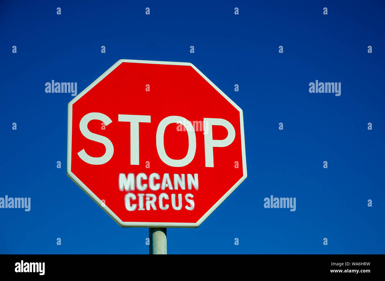 PRAIA DA LUZ, LAGOS /PORTUGAL - AUGUST 18 2019:  Graffiti on Stop sign asking to stop Madeleine McCann circus Stock Photo