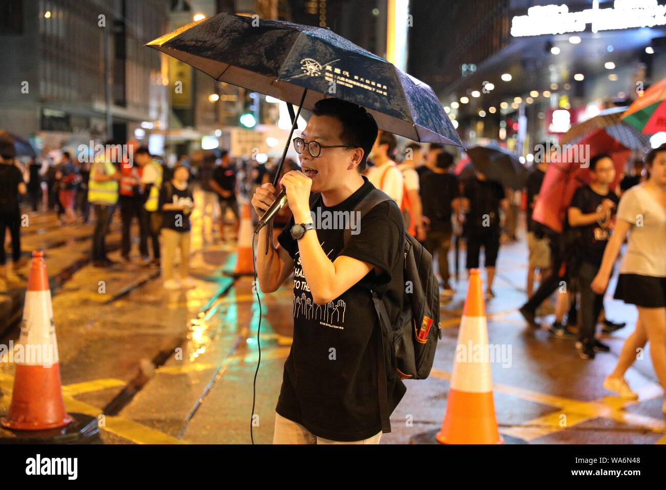 Hong Kong, China. 18 August 2019. Hong Kong Anti Extradition protest. Hundreds of thousands of protesters march through Hong Kong Island. One of the organizers asks protesters to avoid going to China Liaison Office in an attempt to avoid clashes with police Credit: David Coulson/Alamy Live News Stock Photo