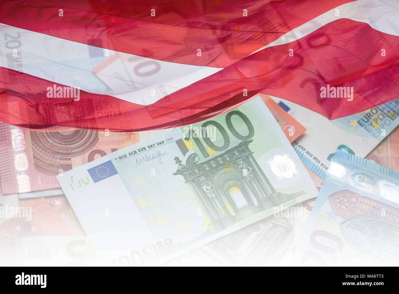 EU Euro banknotes and Latvia Flag, concept Picture, national flag of Latvia and Euro banknote Stock Photo