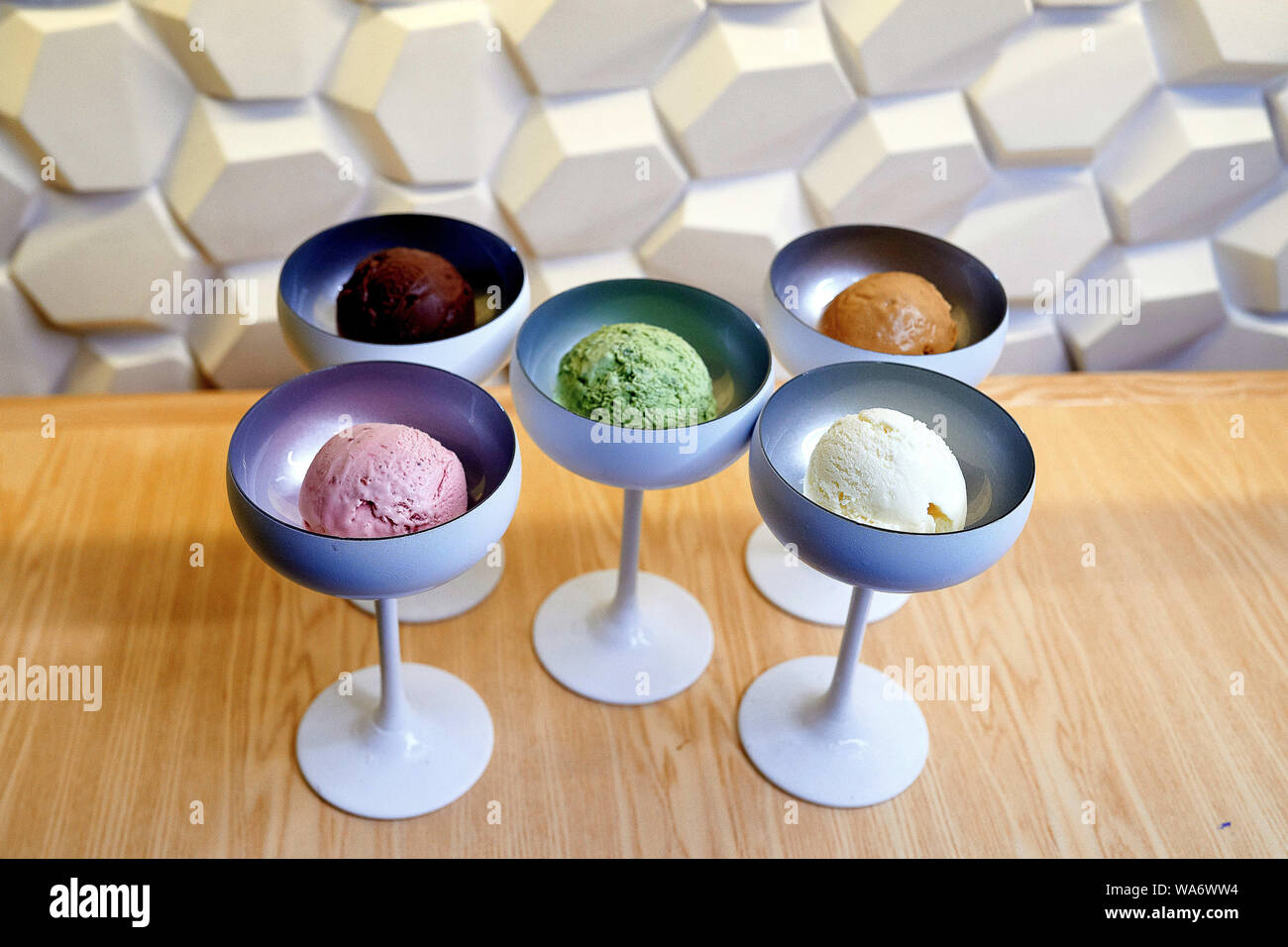 five types of ice cream of different colors in beautiful ice cream