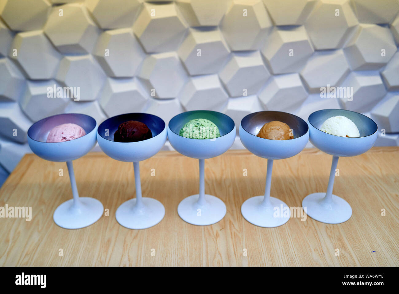 five types of ice cream of different colors in beautiful ice cream