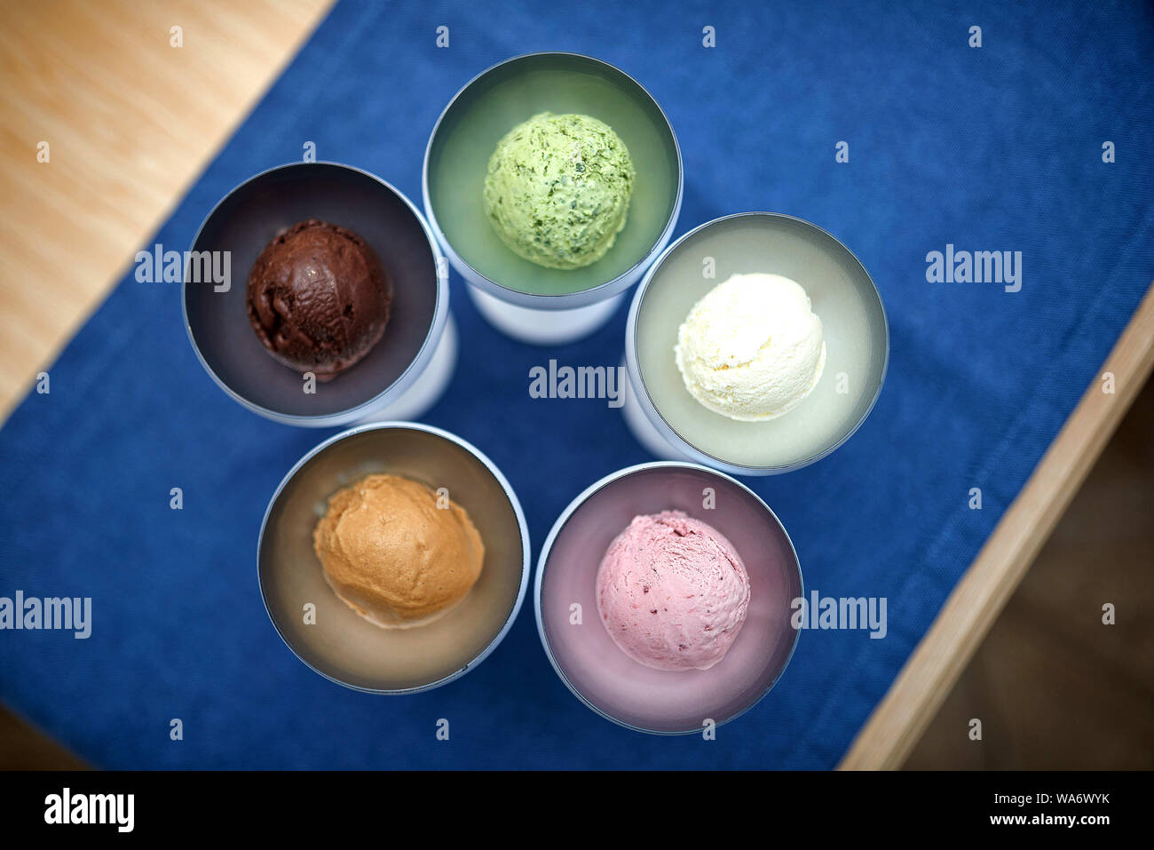 five types of ice cream of different colors in beautiful ice cream