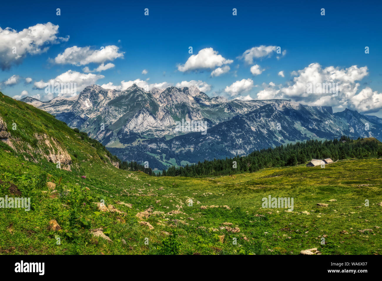 Hiking through swiss alps on a sunny day with blue sky near toggenburg ...