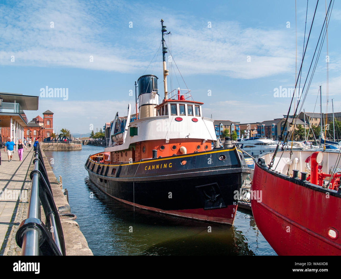 The Canning Tugboat at dock in Swansea Marina. Outside The National Waterfront Museum in Swansea, Wales, UK. Stock Photo