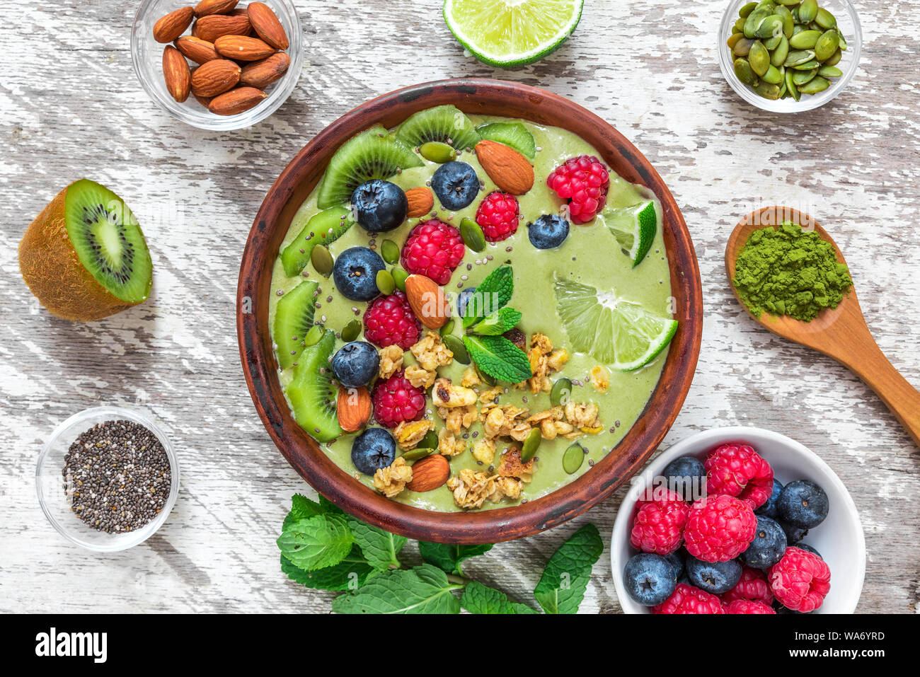 Healthy Vegan Breakfast Matcha Green Tea Smoothie Bowl With Fresh Fruits Berries Nuts Seeds And Granola Top View Flat Lay Stock Photo Alamy