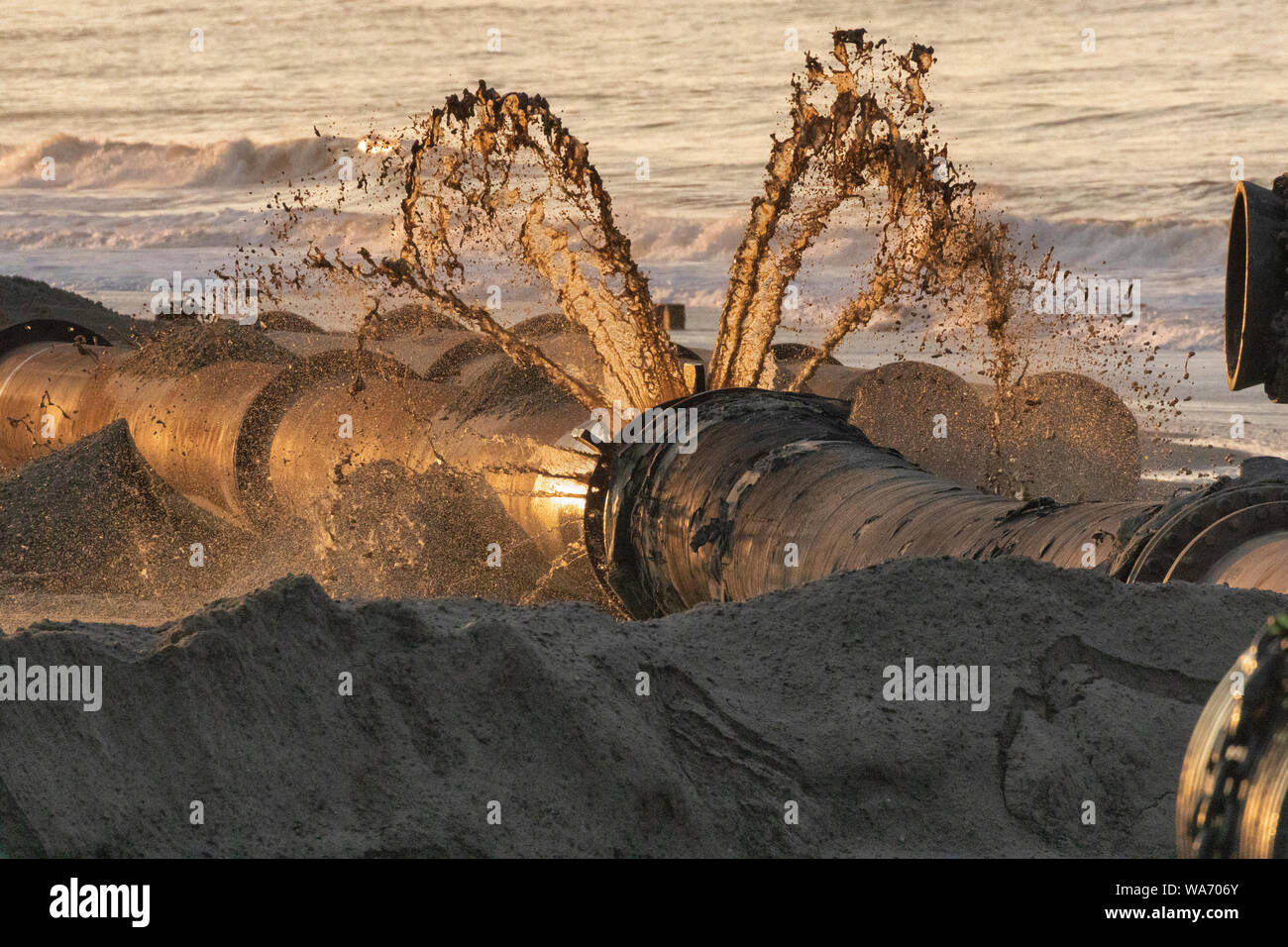 Sand sculpture works, Walcott, Norfolk, East Anglia, UK Stock Photo Alamy