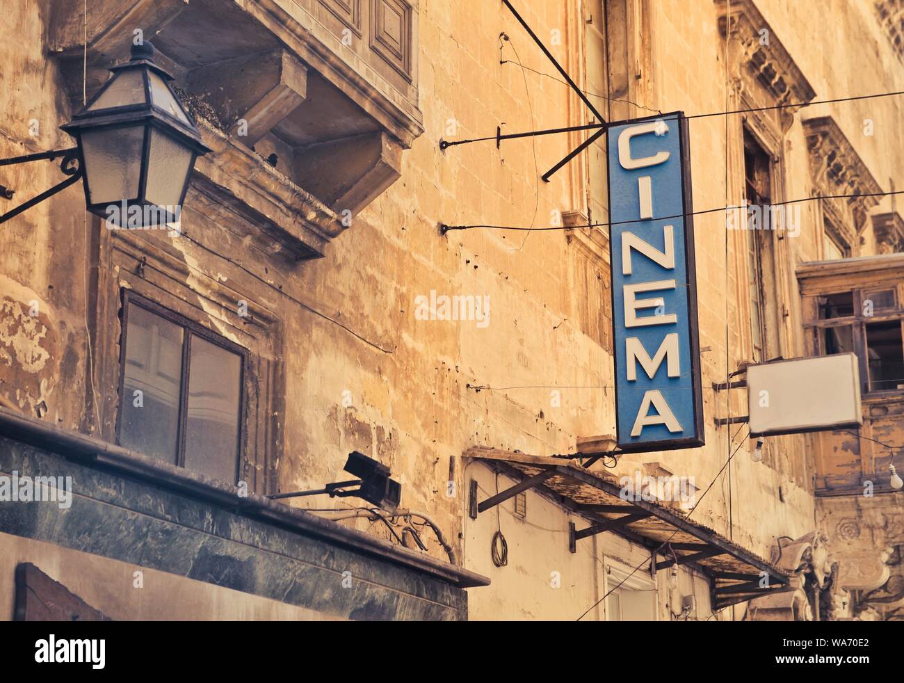 Shot of cinema sign on a brown building Stock Photo