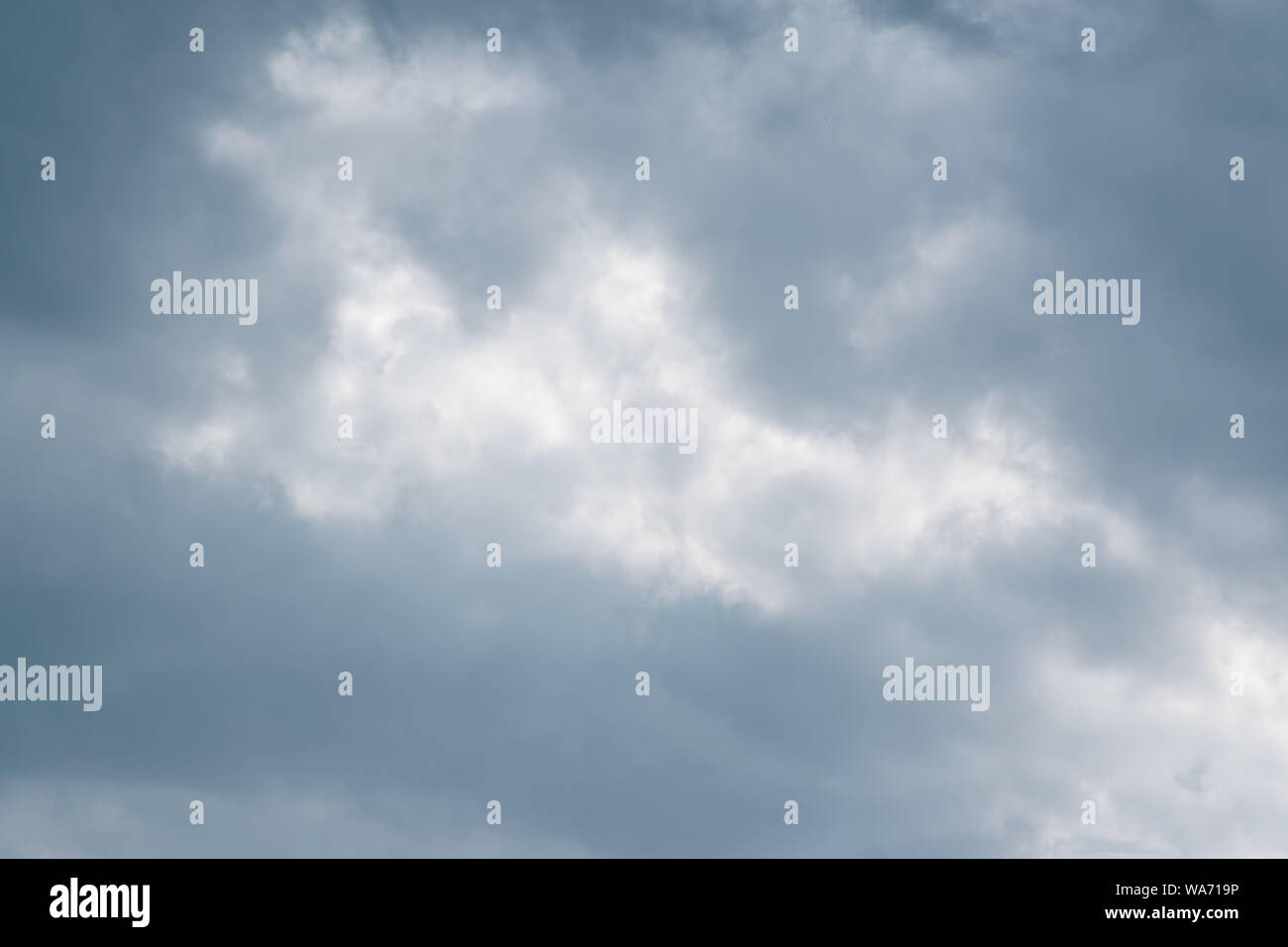Blue sky with gray clouds in evening. Stock Photo