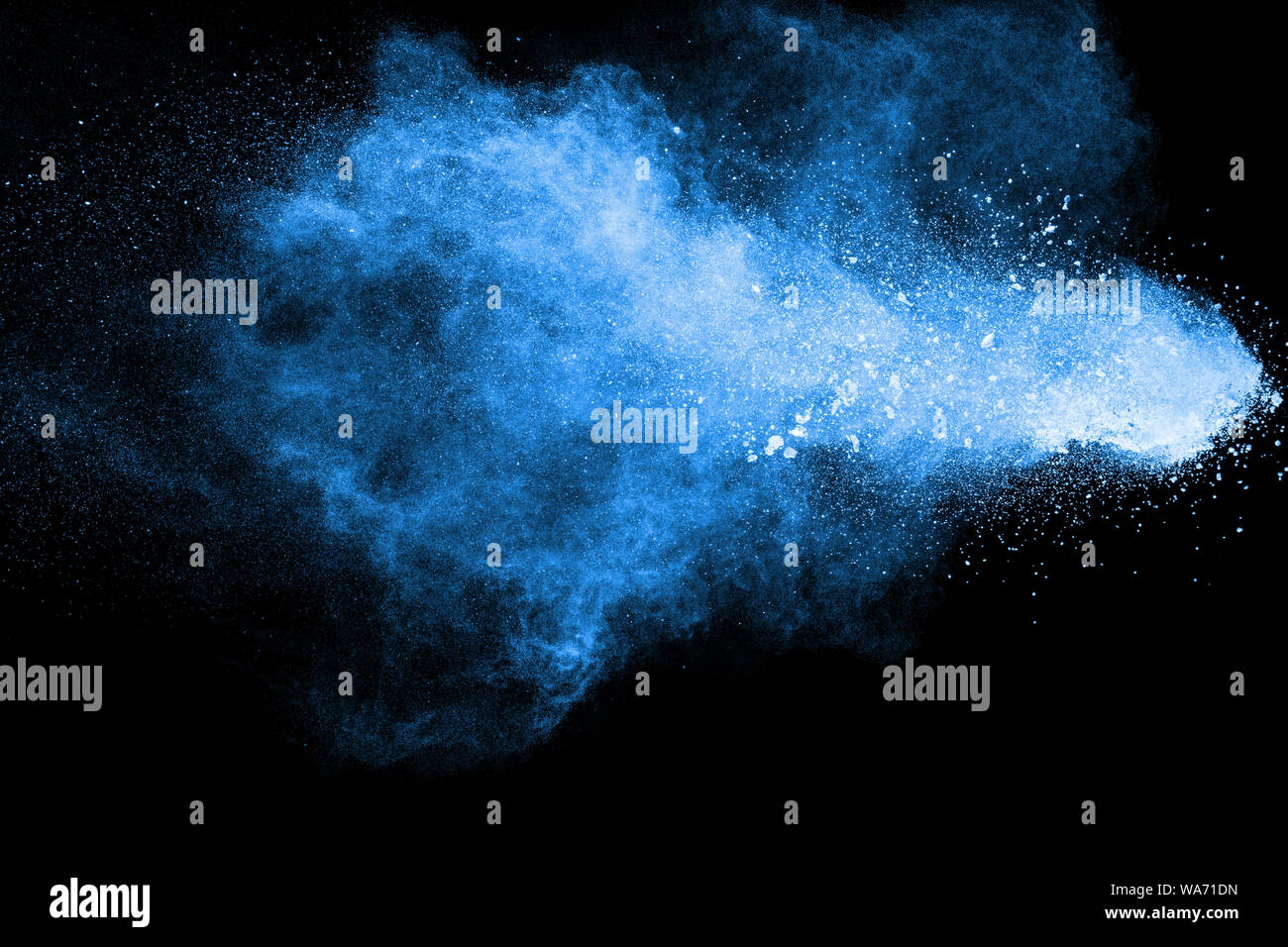 Blue Purple Dust Explosion On Black Background Freeze Motion Of