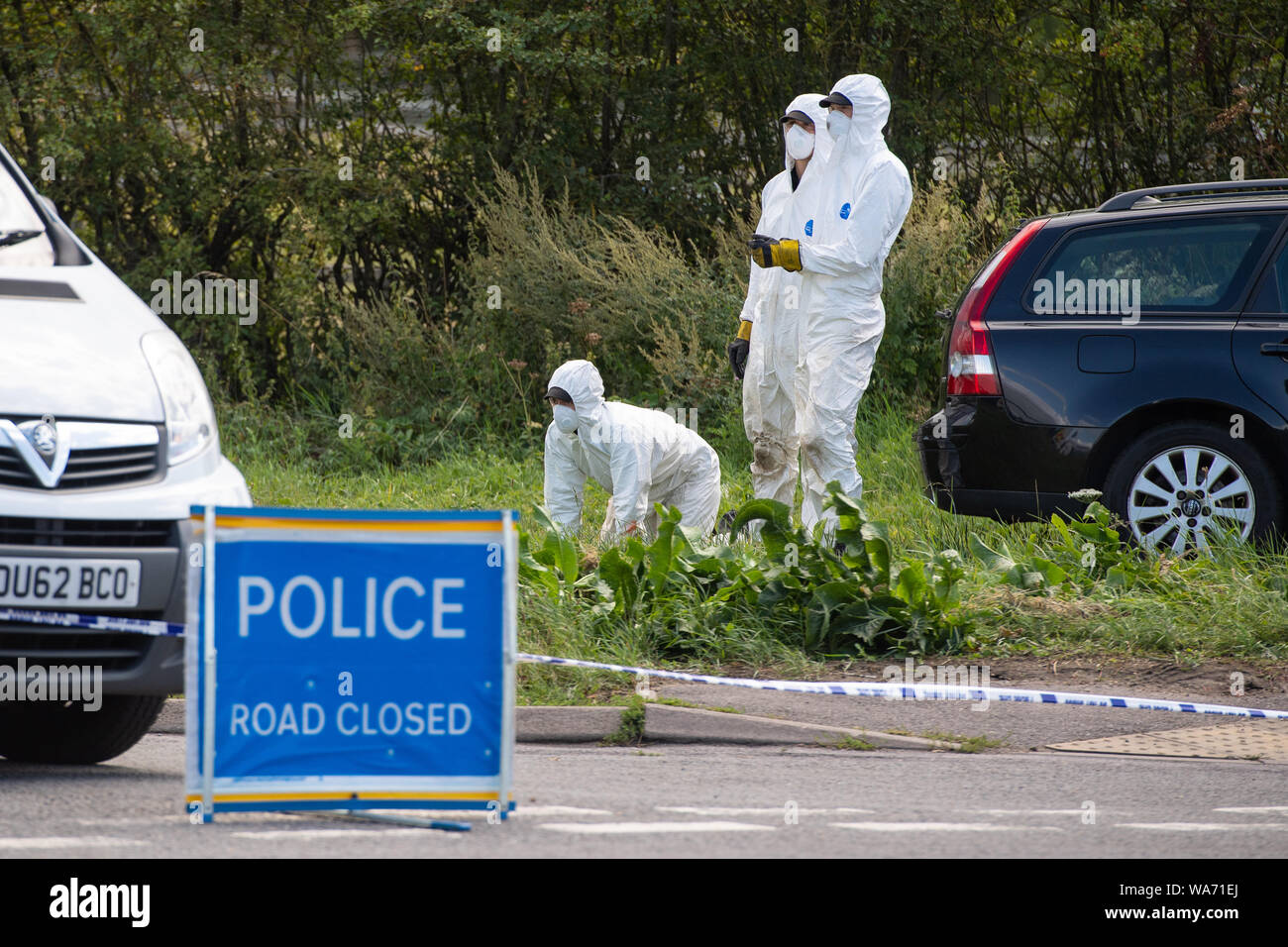 Police officers search near the scene where Thames Valley Police officer Pc Andrew Harper, 28, died following a 'serious incident' at about 11.30pm on Thursday near the A4 Bath Road, between Reading and Newbury, at the village of Sulhamstead in Berkshire. Stock Photo