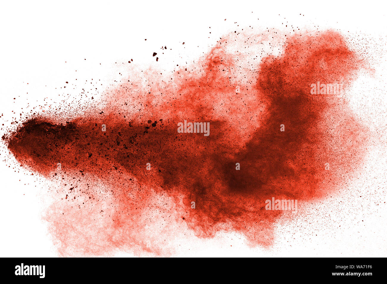abstract red dust splattered on white background. Red powder explosion. Stock Photo