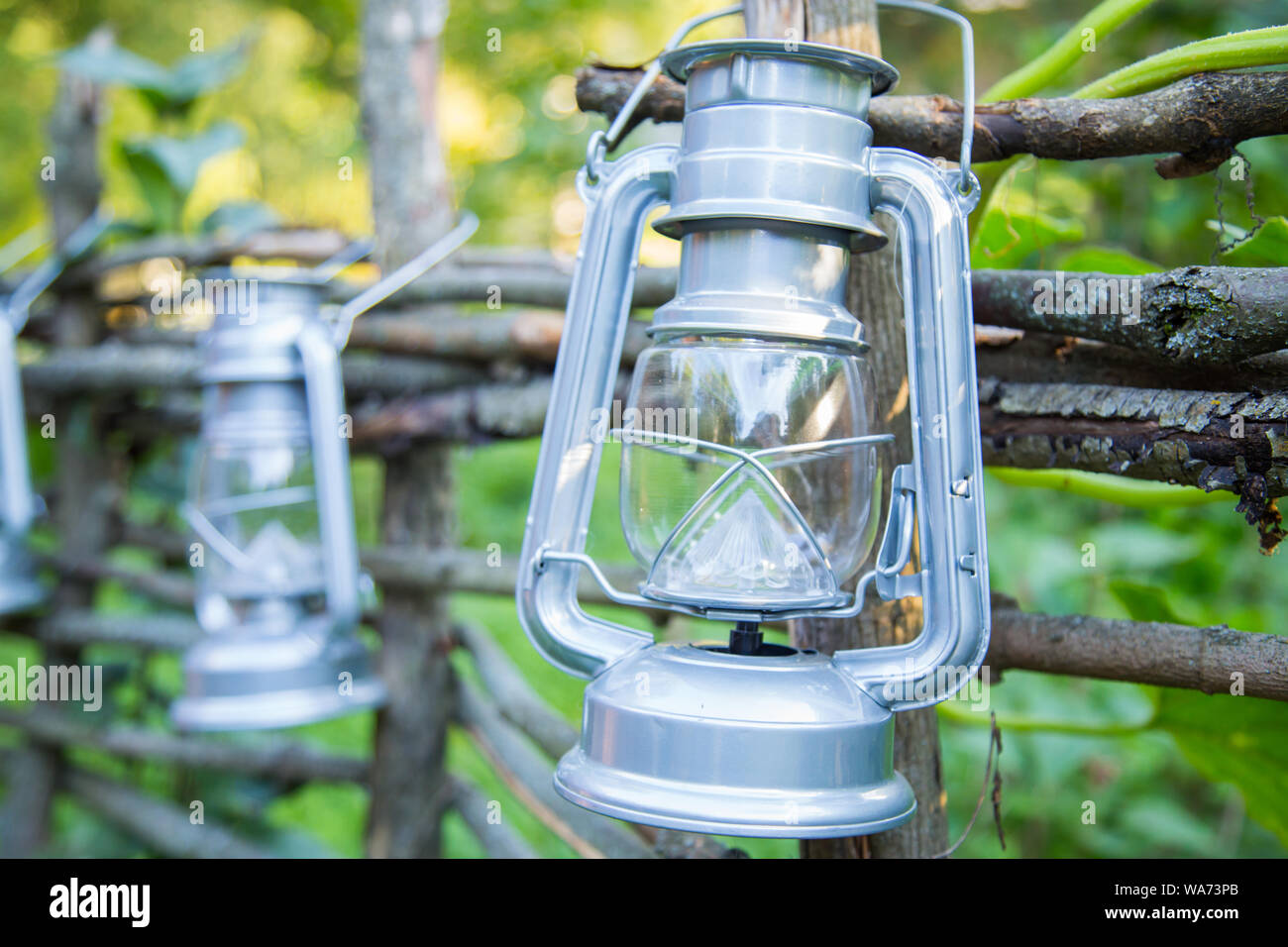 Old fashioned hanging lanterns hi-res stock photography and images - Alamy