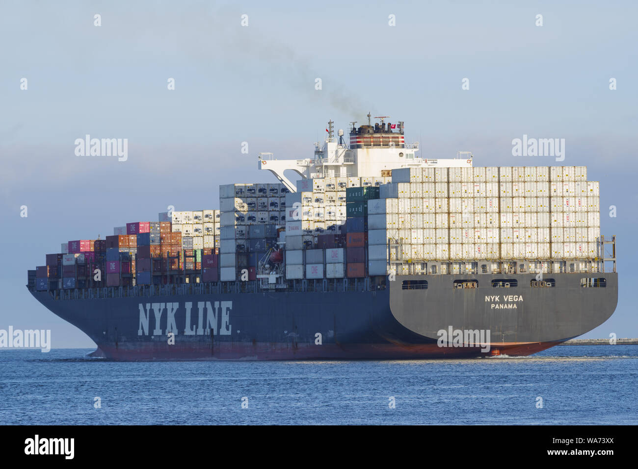 Image of a NYK Line container ship shown departing the Port of Los Angeles. Stock Photo
