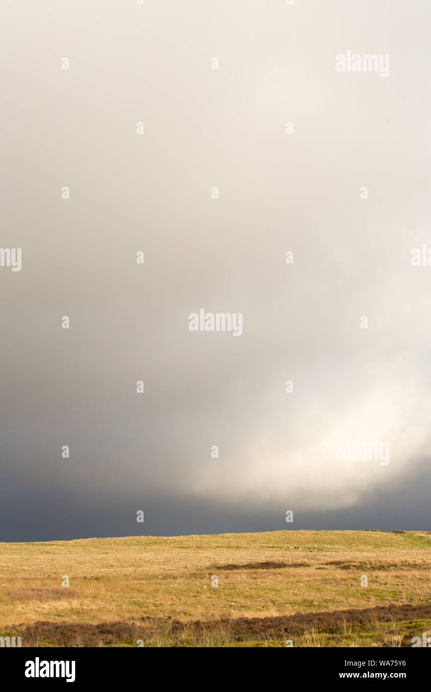 Big moody skies, portrait, Pennine Moors Stock Photo