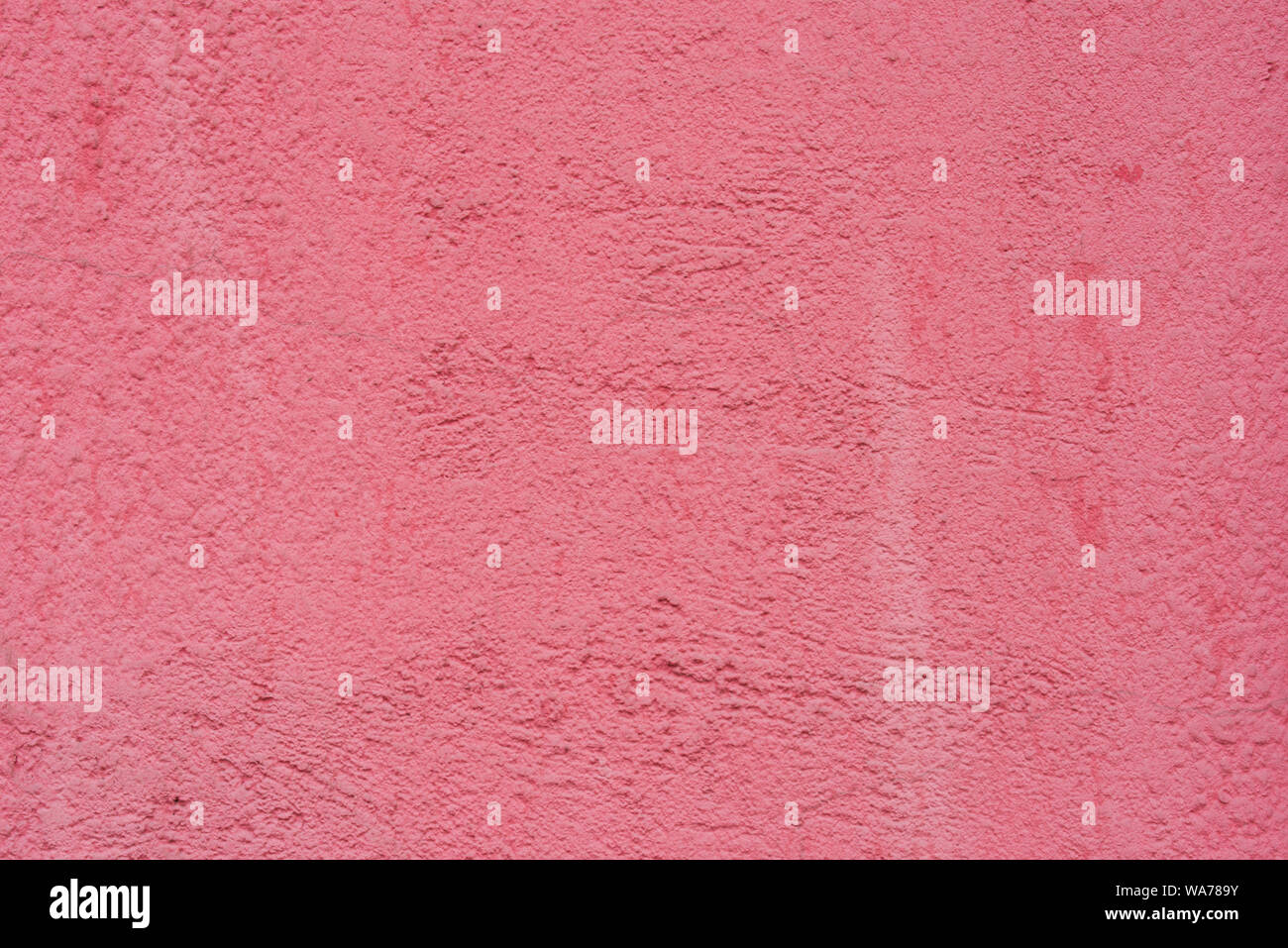 red color painted plastered wall background texture Stock Photo