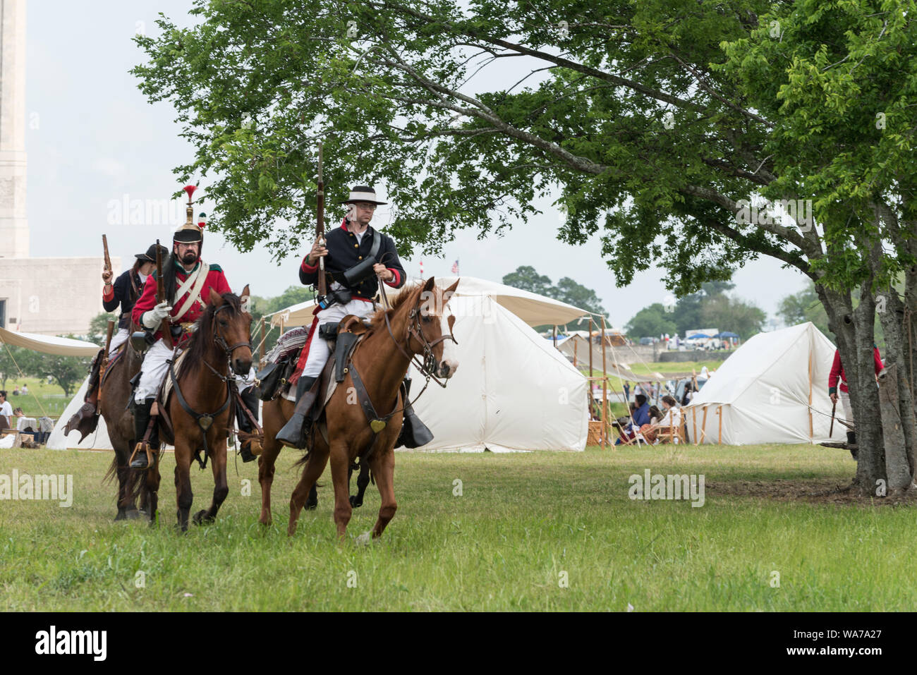 Advance scouts head out from the Mexican encampment at the annual Battle of San Jacinto Festival and Battle Reenactment, a living-history retelling and demonstration of the historic Battle of San Jacinto in La Porte, Texas Stock Photo