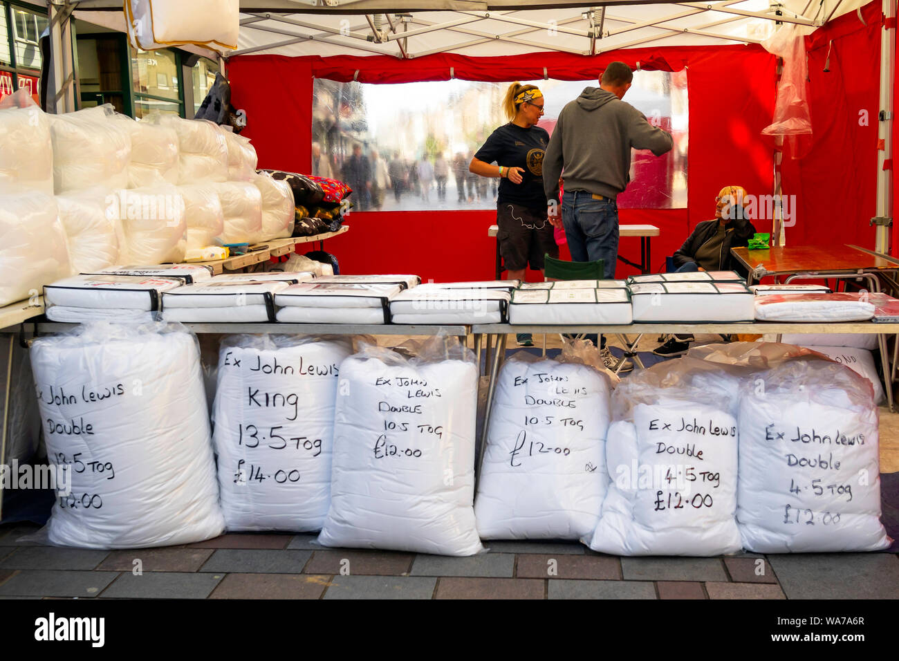 Display Of Bed Linen At A Weekly Market In Darlington With Duvets