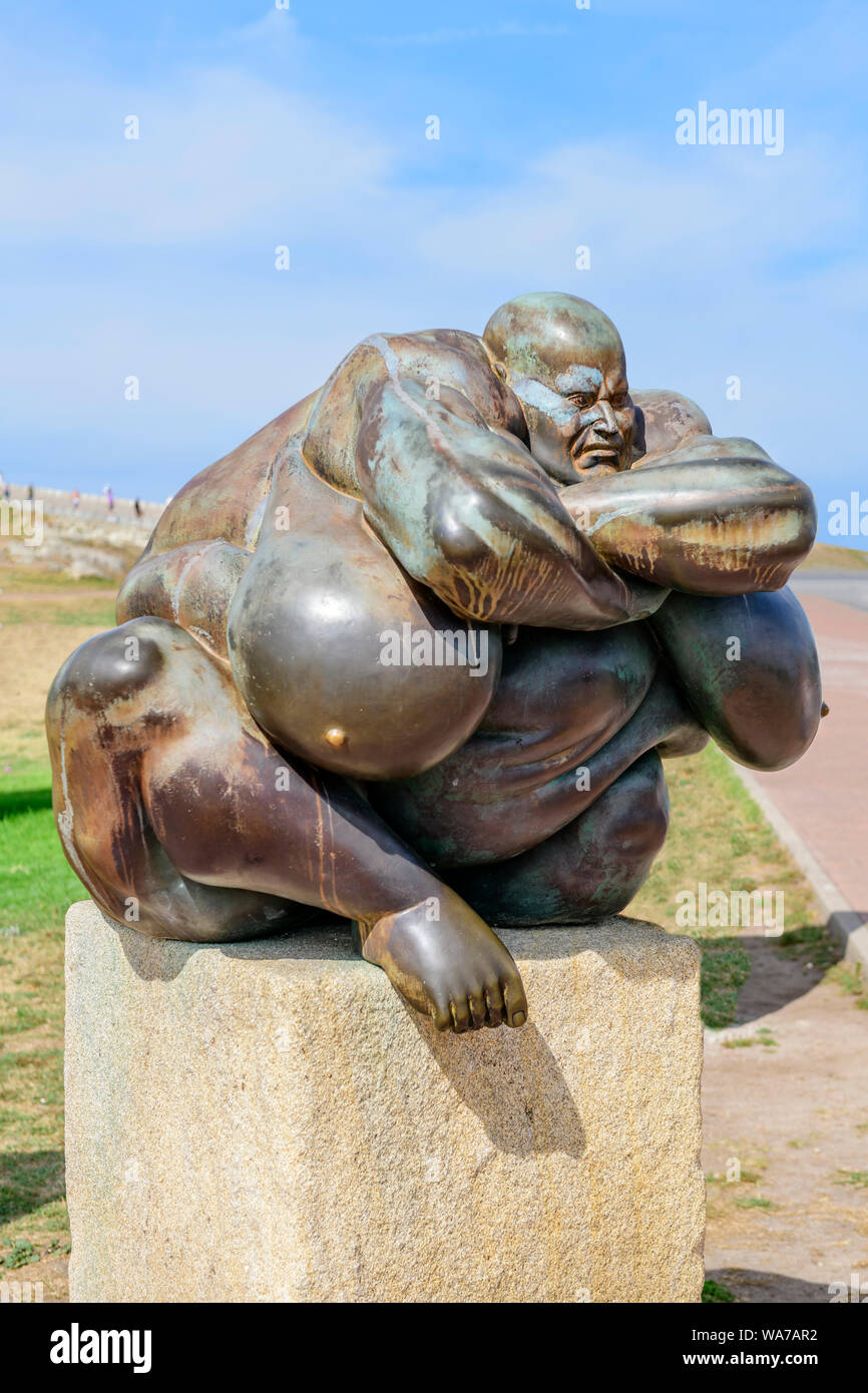 The guardian El Guardian, a sculpture statue monument by Ramin Conde on guard at the tower of hercules La Coruna, Spain. Stock Photo