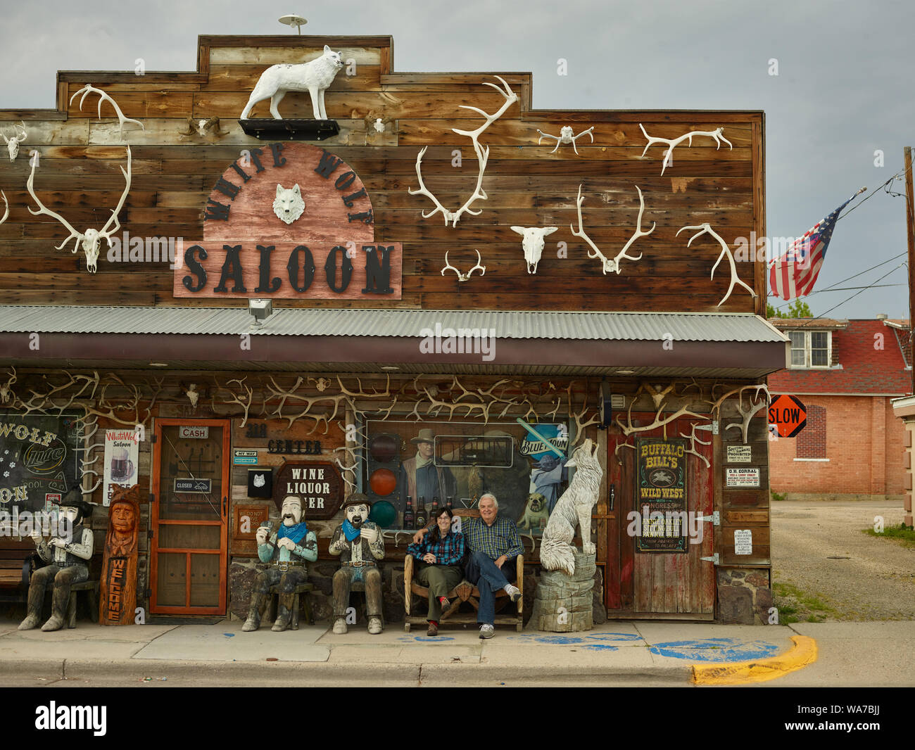 American photographer Carol M. Highsmith, and her husband, journalist Ted Landphair, could not resist getting INTO a photograph with some new and evocative Old West friends at the distinctive White Wolf Saloon in Douglas, site of the annual Wyoming State Fair Stock Photo
