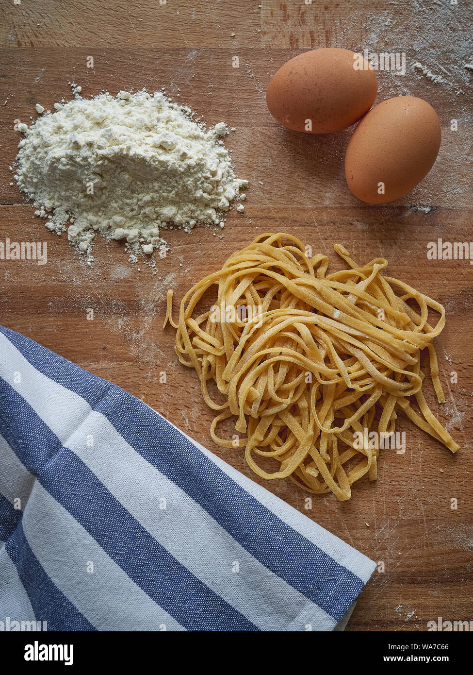Handmade stringozzi (or strangozzi), an Italian wheat pasta similar to noodles, among the more notable of those produced in the Umbria region. Stock Photo
