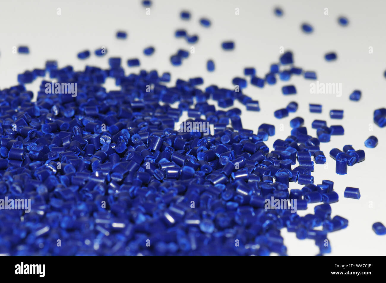 dark blue plastic resin granulate isolated Stock Photo