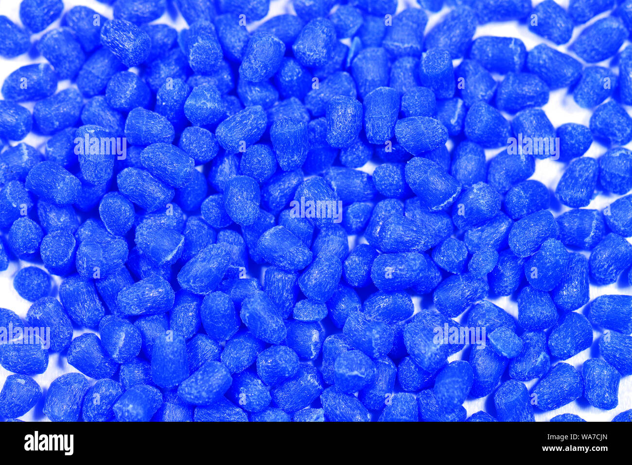 translucent blue polymer resin for injection moulding Stock Photo