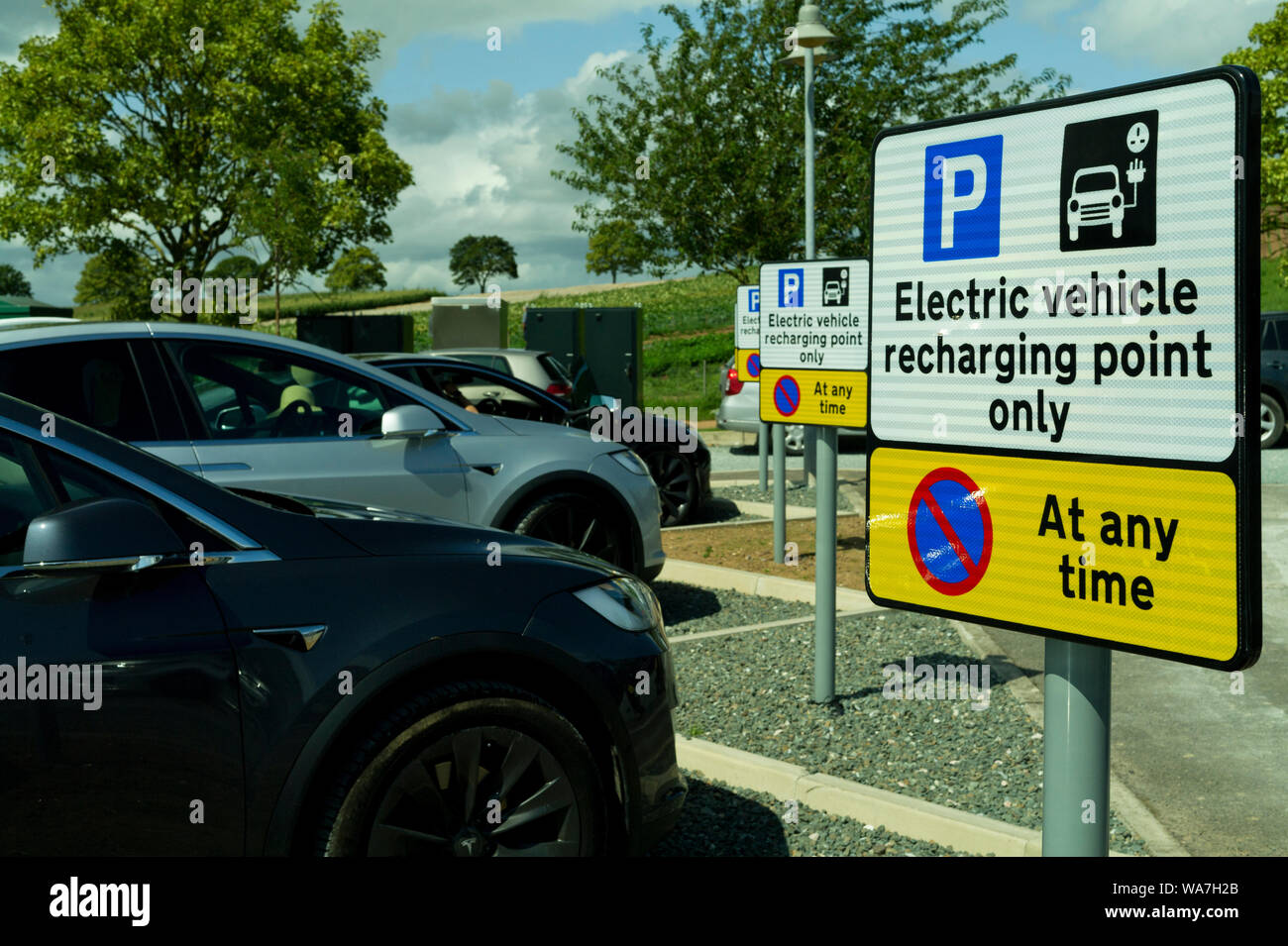 Tesla Electric vehicle charging Points. Darts Farm, Topsham Devon UK Stock Photo