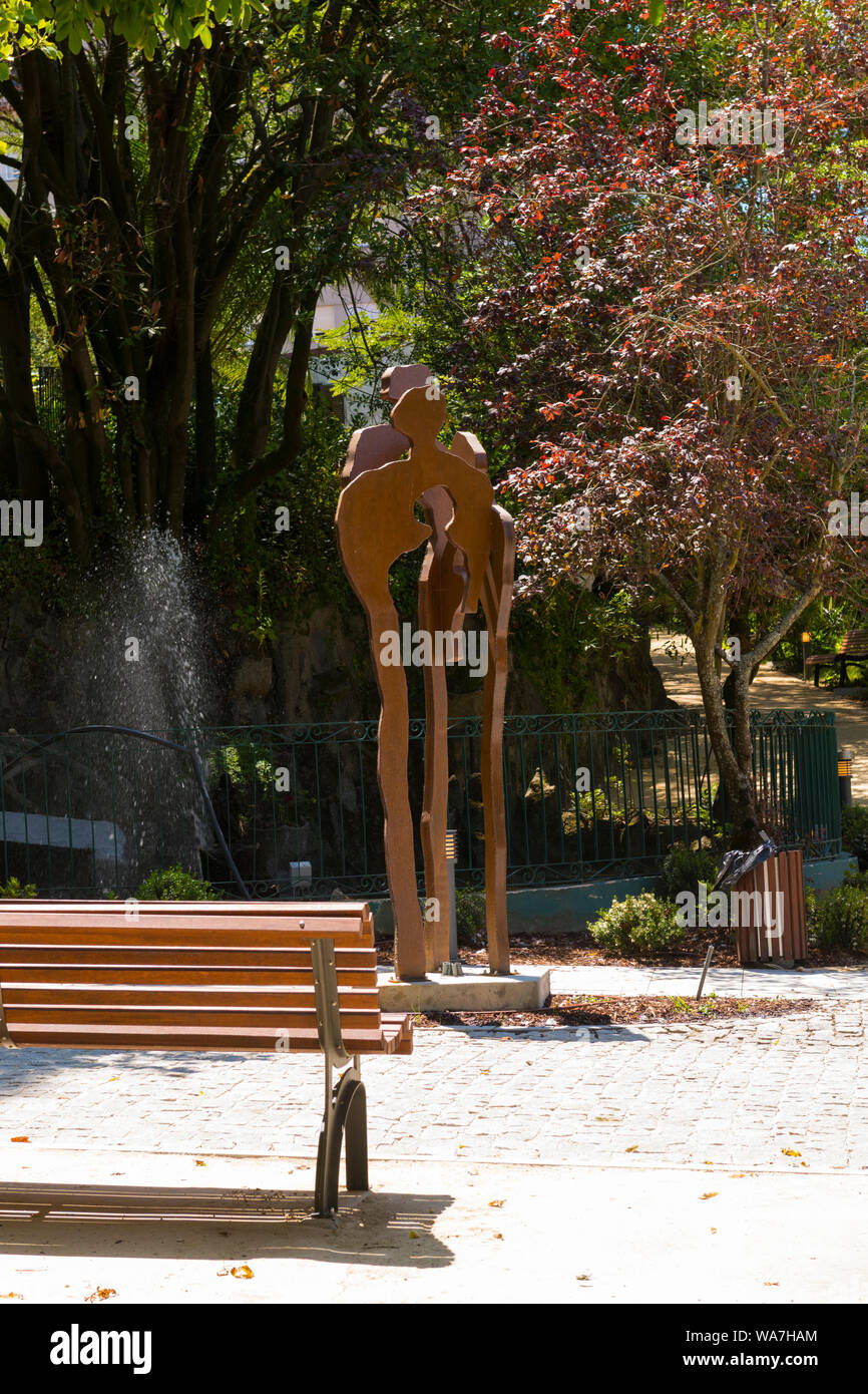 Portugal Vila Nova de Gaia Quinta da Boeira founded 1850 hotel restaurant gardens park modern contemporary metal statue sculpture trees wooden bench Stock Photo