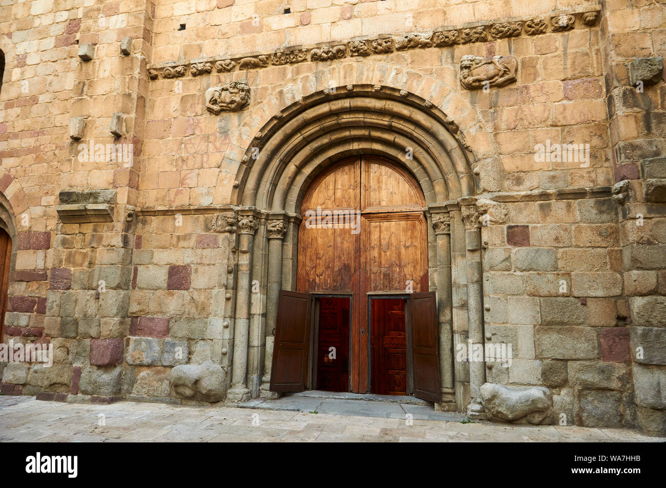 Main entrance and frontage of Santa Maria d’Urgell cathedral at sundown (La Seu d'Urgell, Alto Urgel, Lleida, Pyrenees, Cataluña, Spain) Stock Photo