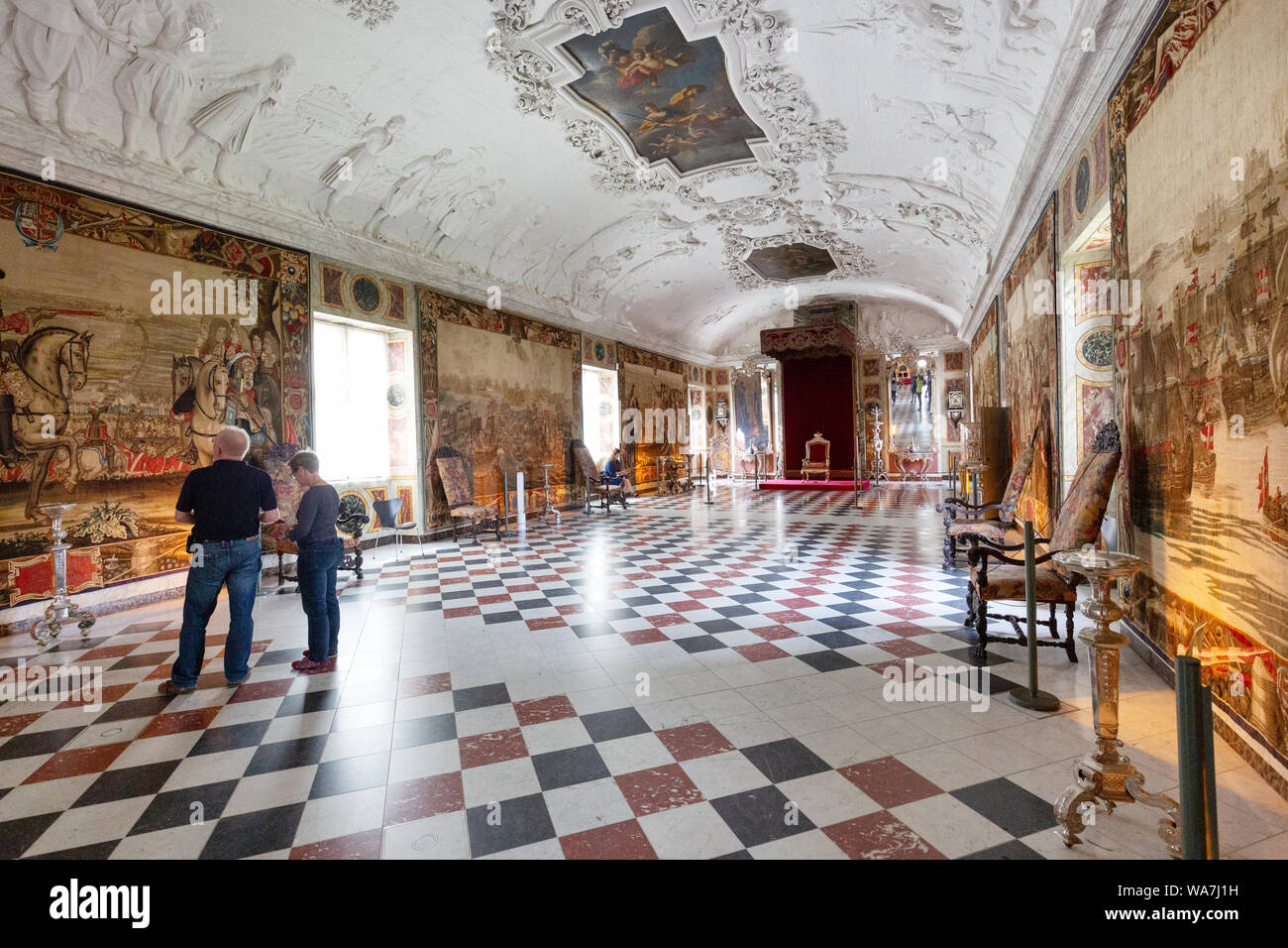Visitors in the Main Hall or Great Hall,  Rosenborg Castle interior, Copenhagen Denmark Scandinavia Stock Photo