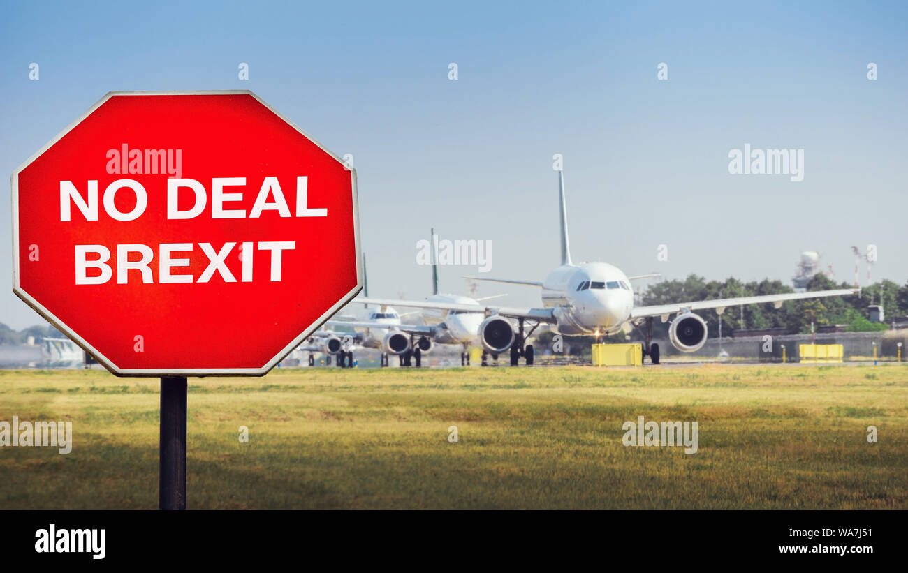 No Deal Brexit digital composite with row of airplanes in background. UK is set to leave the EU by default on October 31st, 2019 leading to a potentia Stock Photo