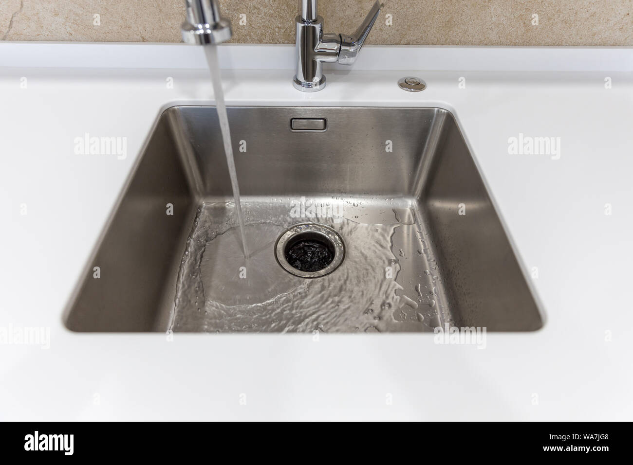 Stainless Kitchen Sink With Food Waste Disposal Stock Photo Alamy