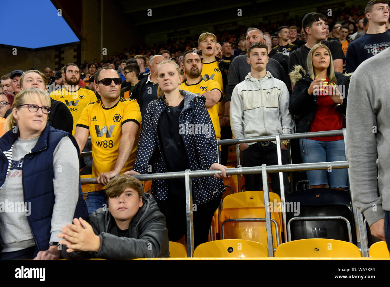 Football supporters using safe standing seats at Molineux Football Stadium home of Wolverhampton Wanderers FC. Stock Photo