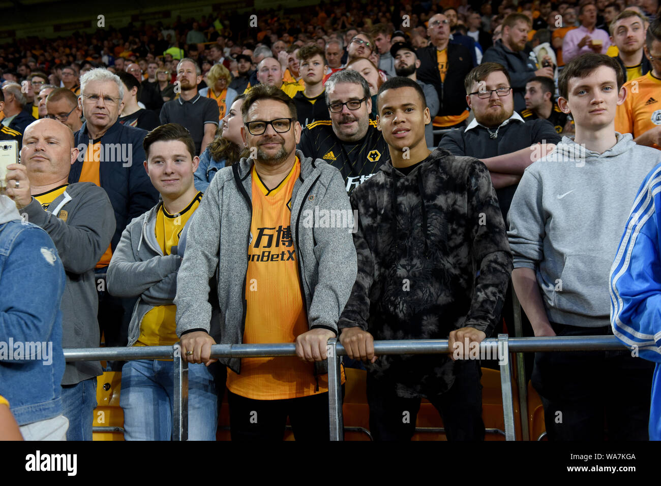 Football supporters using safe standing seats at Molineux Football Stadium home of Wolverhampton Wanderers FC. Stock Photo