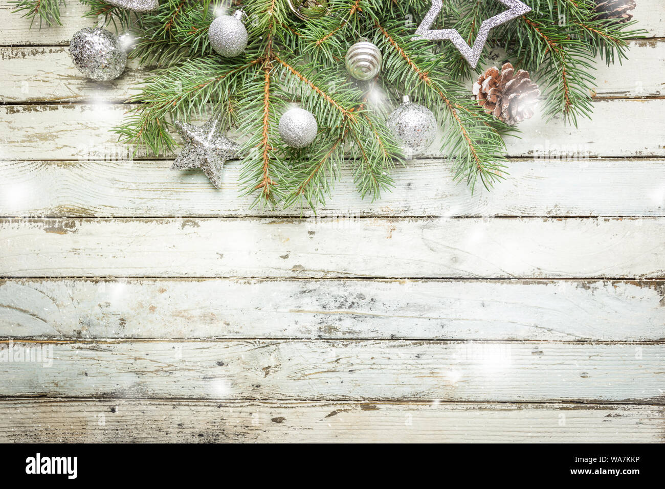Christmas wooden background with fir tree and decorations. Top view ...