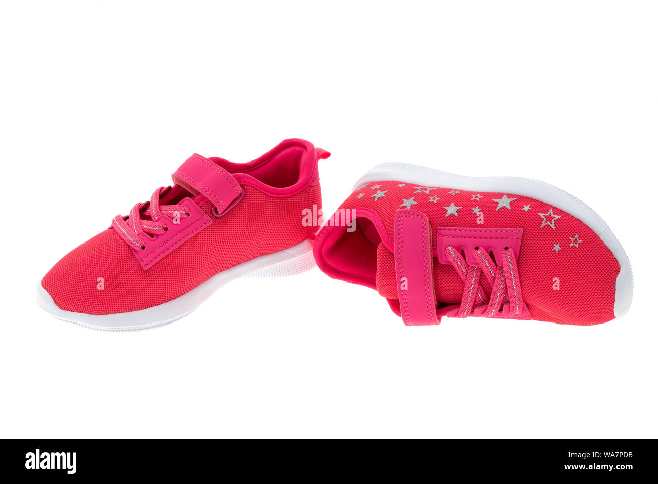 Pair of girls canvas shoes - white background Stock Photo