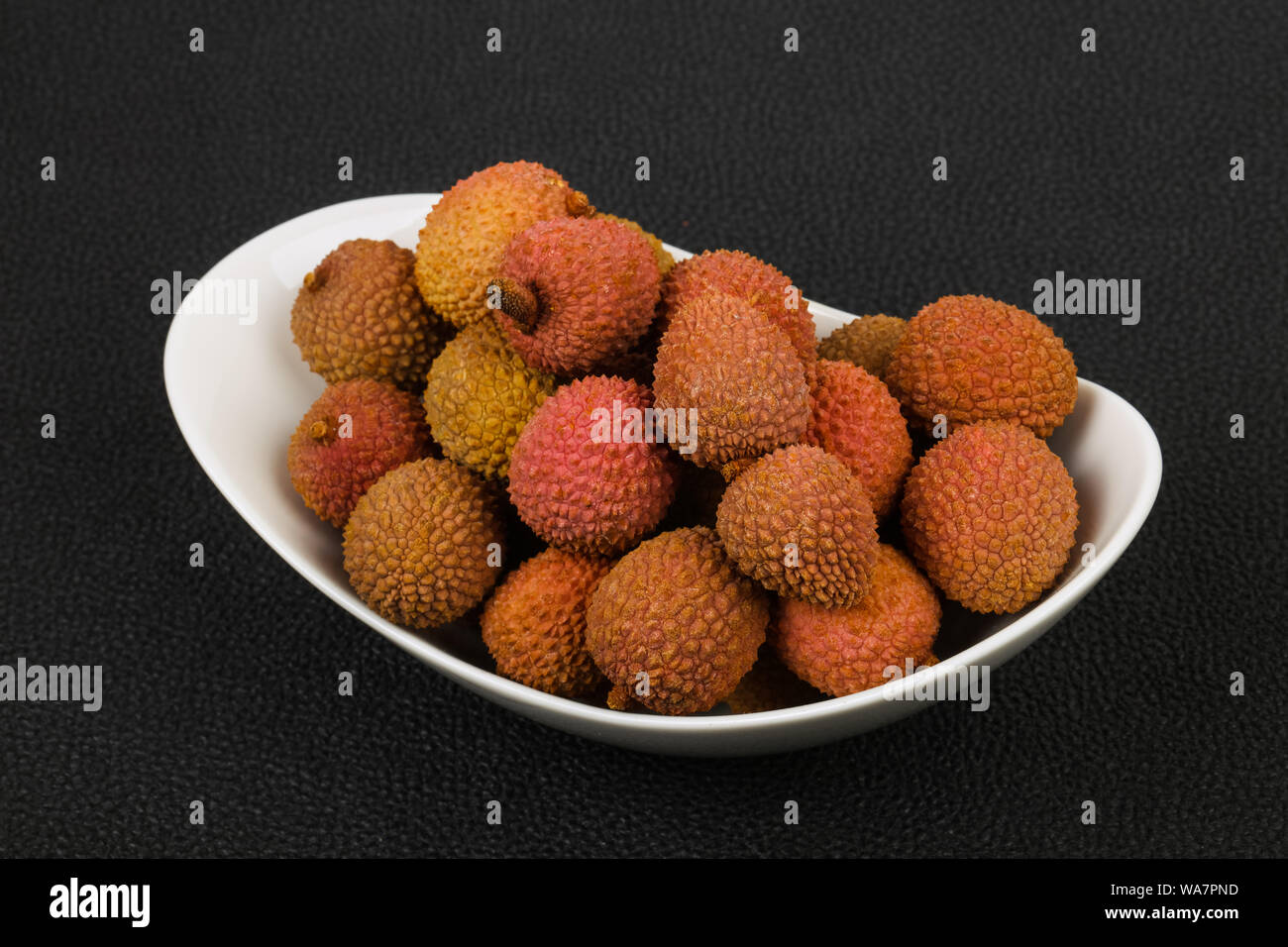 Tropical fruit lychee in the bowl Stock Photo Alamy