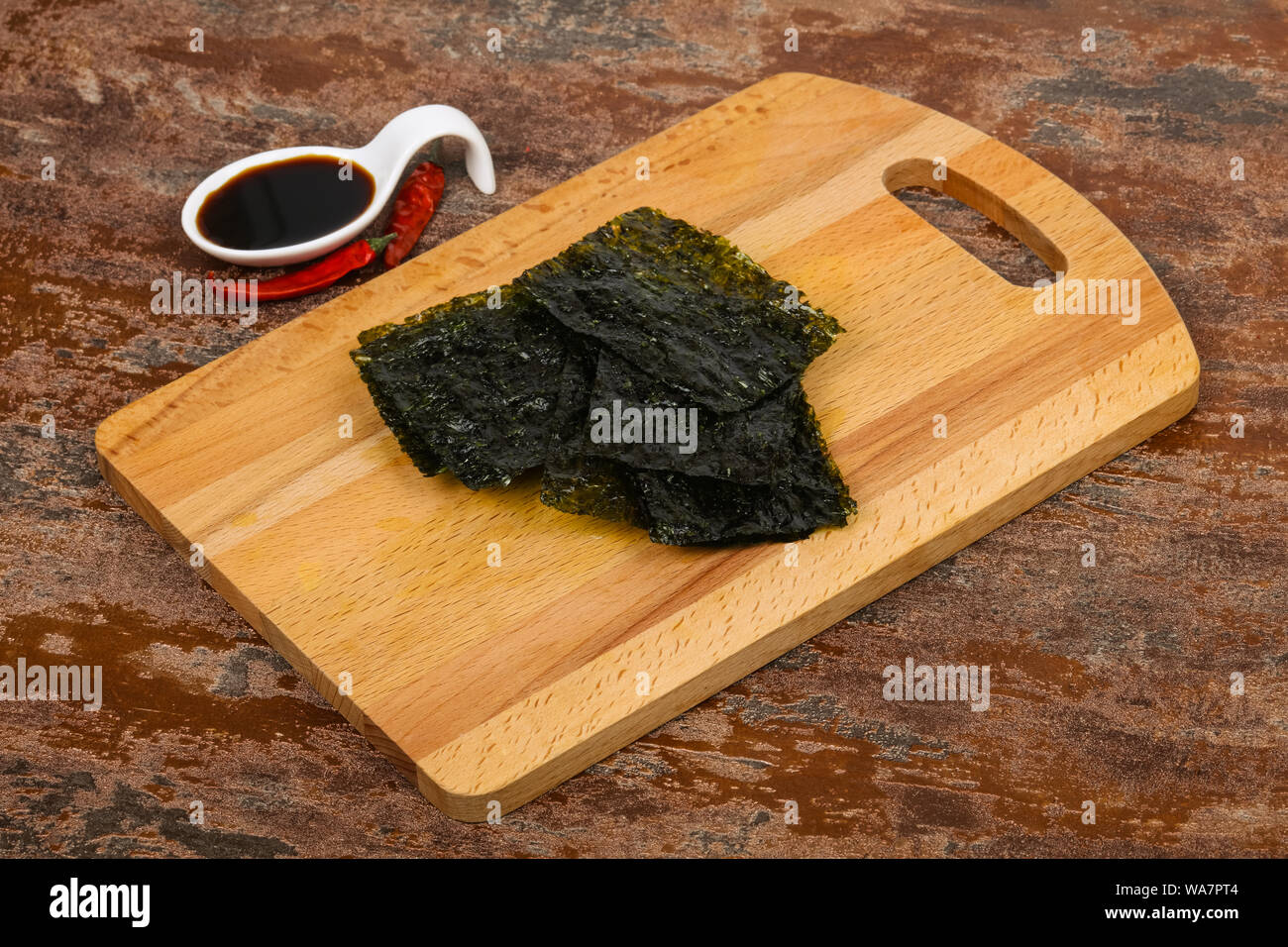 Tasty Nori chips with soya sauce Stock Photo Alamy