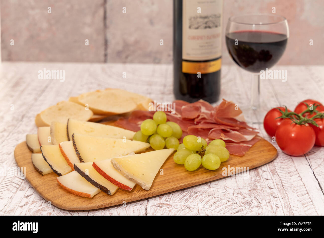 A plate of Spanish tapas Cured meat and cheese platter Stock Photo