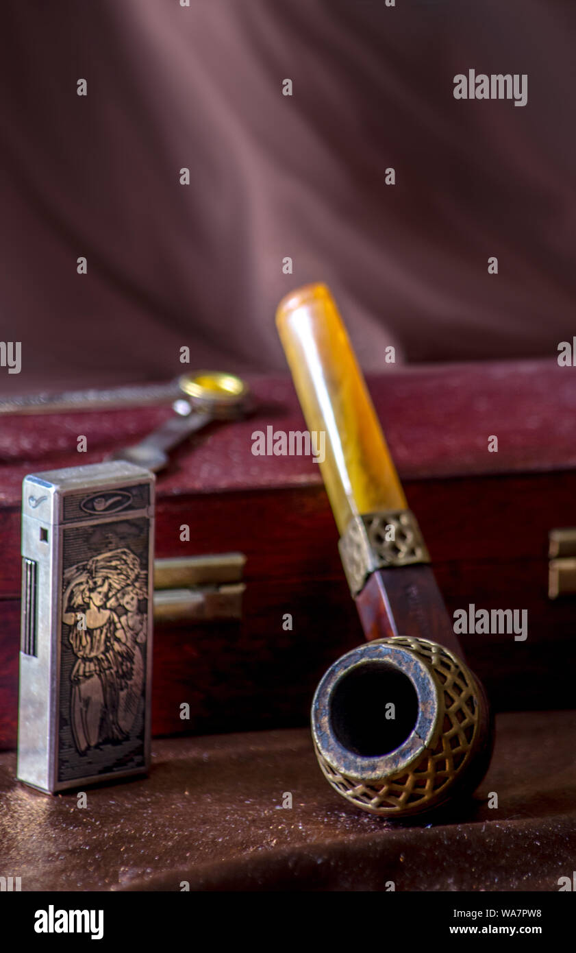 antique pipe and lighter with wood pipe box Stock Photo Alamy